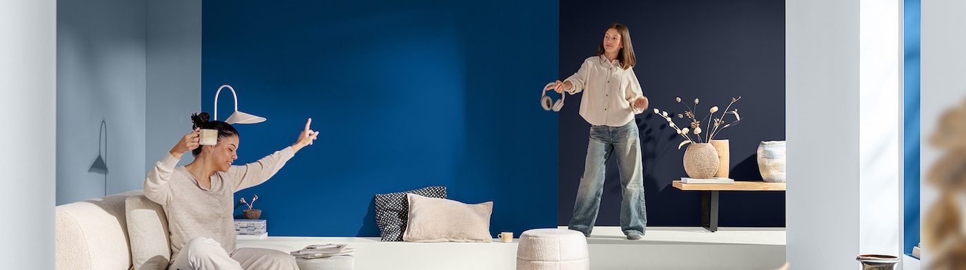 A plain contemporary living room with yellow furnishings