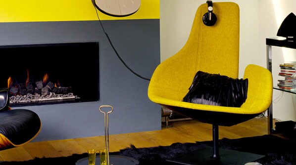 Sophisticated grey living room mixed with bright yellow pops of colour.