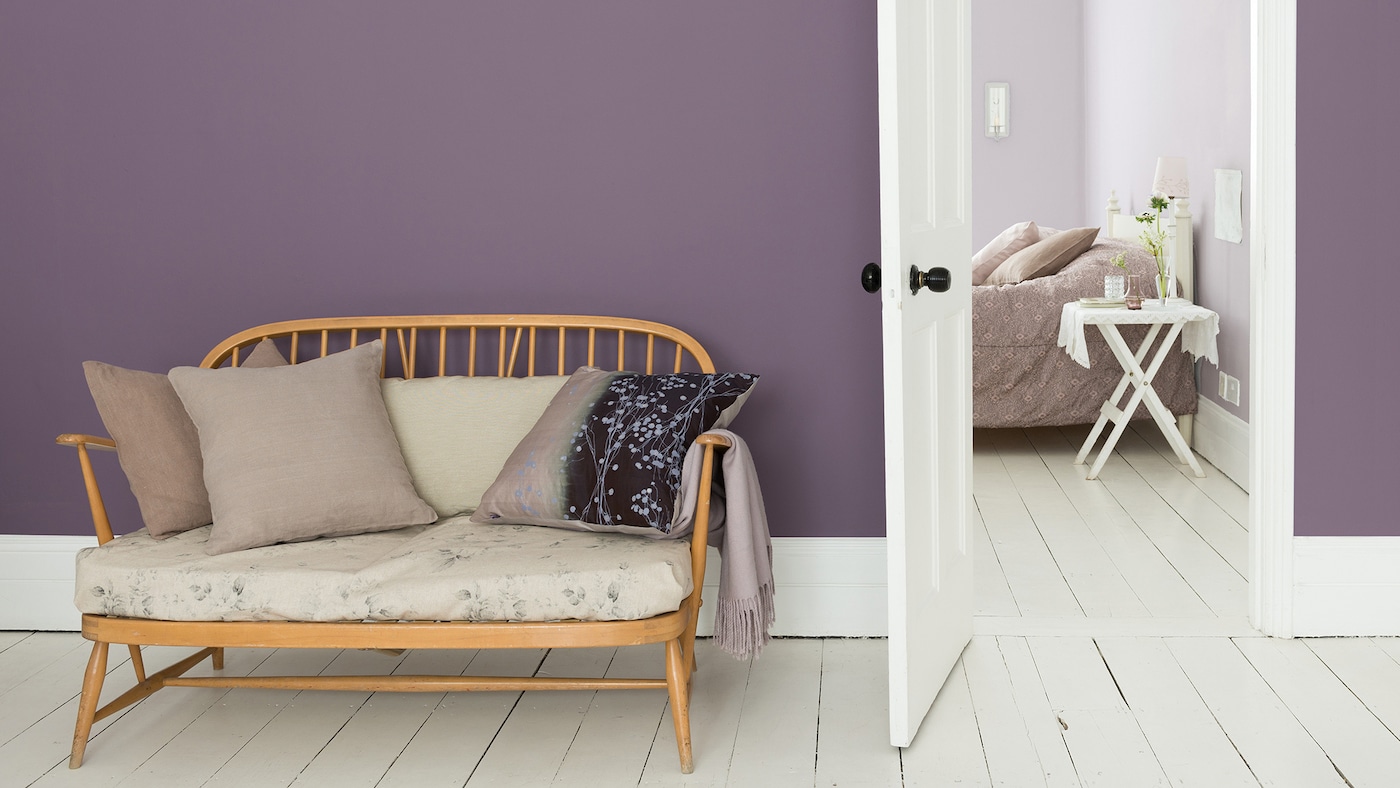 Make a bold statement in the hallway with a purple and white colour scheme.