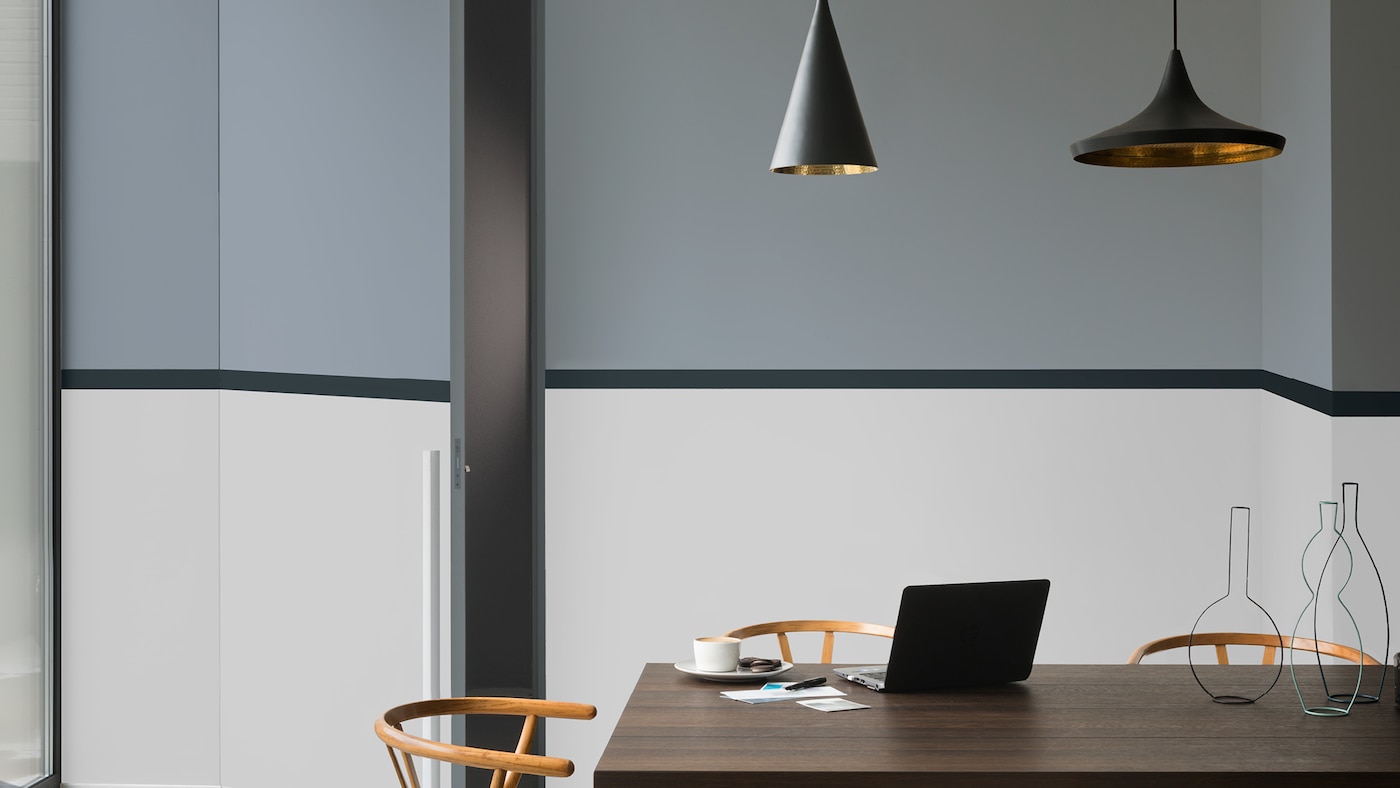 Choose a dining table that doubles up as a working table.