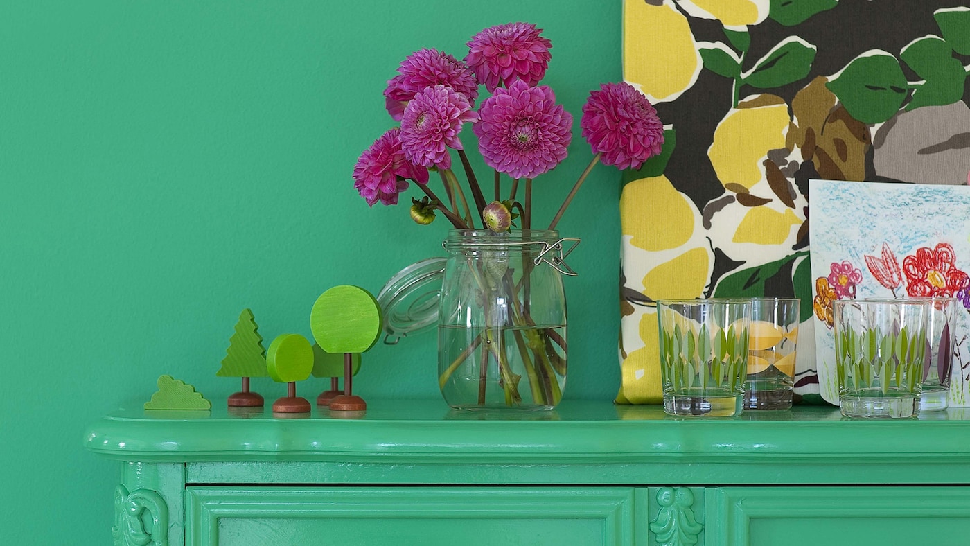 Kitchen cabinets painted in bright green.