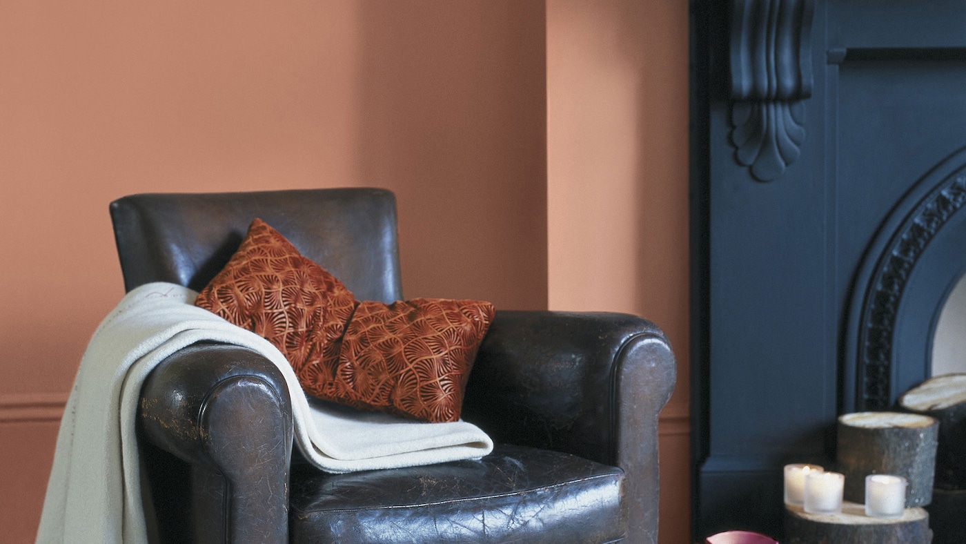 Looking to add warmth to your living room? Why not try painting a feature wall in a rich terracotta brown.