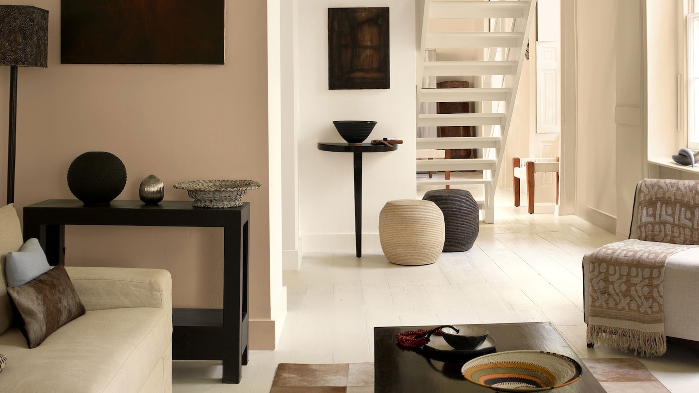Create an elegant living room by layering neutrals with touchable textures.