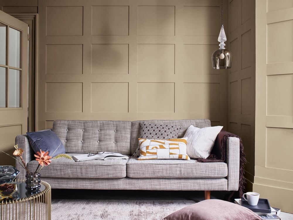 Living room painted in Brave Ground