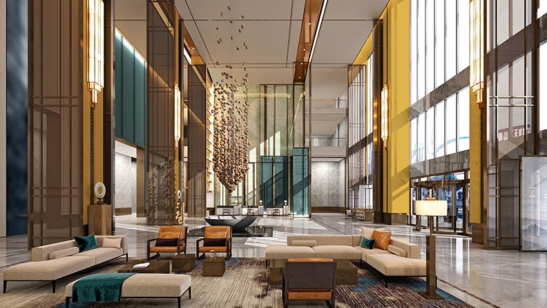 En indbydende hotellobby i grøn og gul