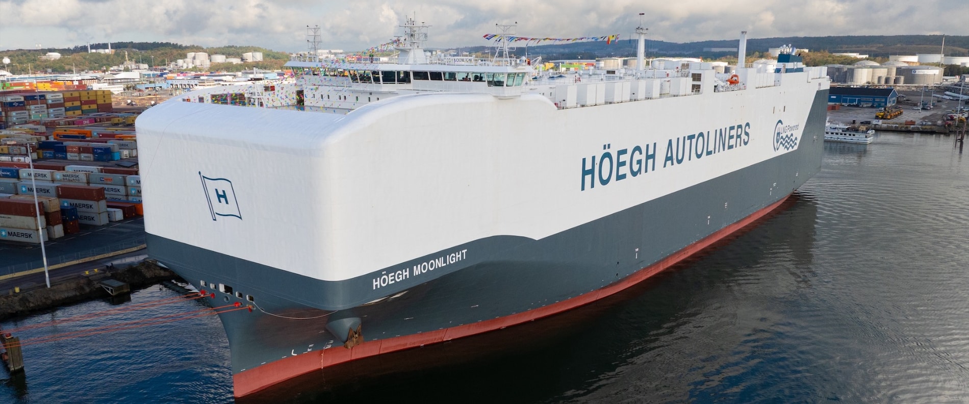 Höegh Autoliners Aurora Class PCTC vessel docked at port.