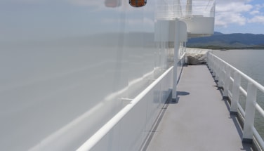 Exterior vessel walkway and superstructure with finished protective coating