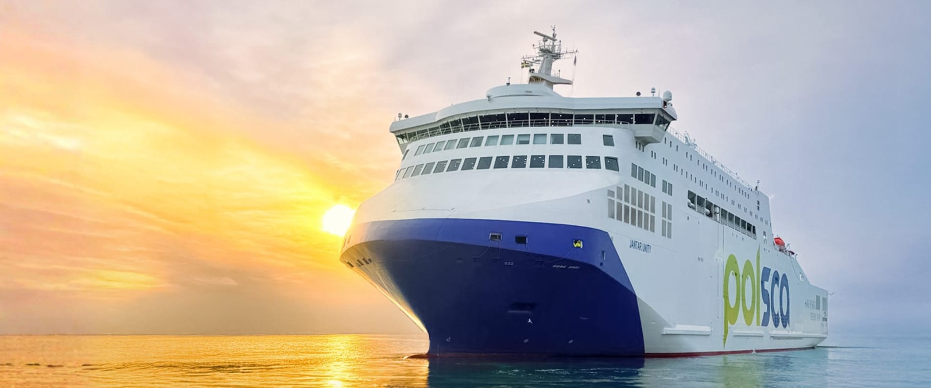 Jantar Unity passenger ferry sailing at sea during sunset