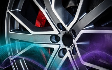 Close-up of a car wheel, illustrating powder coating use.