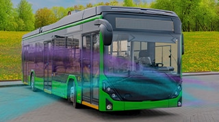 Green bus with durable corrosion-resistant coating parked on road