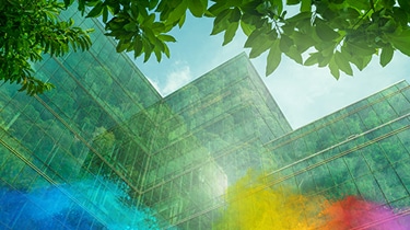 Glass building with green reflections.