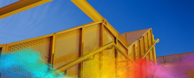 Yellow metal staircase coated with Interpon Low-E powder coating