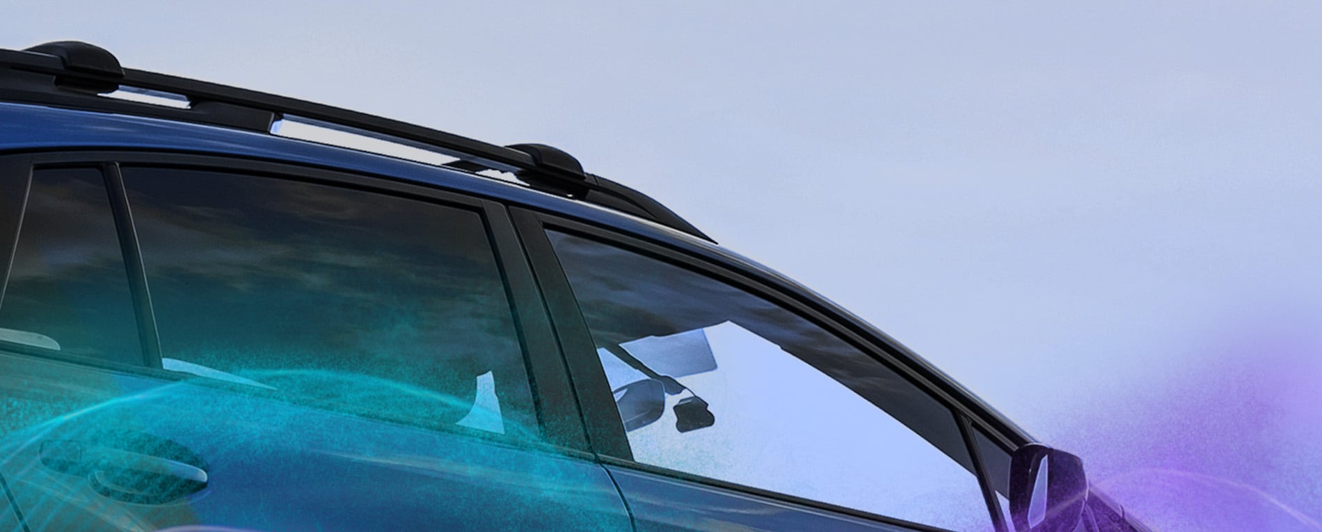 Side view of a blue car showing coated body panels, door handle, and window trim.