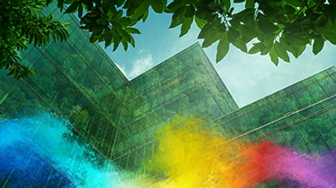 Glass building with green reflections.