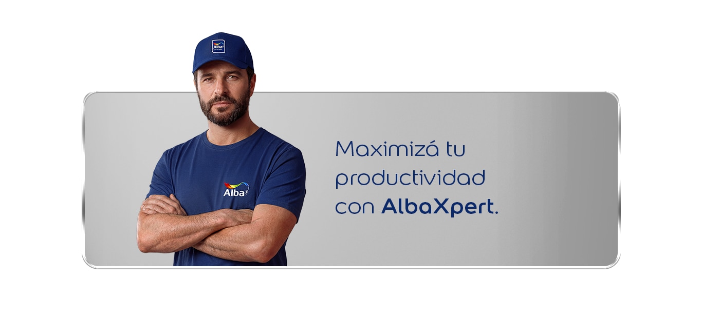 Pintor profesional con uniforme Alba y brazos cruzados junto al mensaje “Maximizá tu productividad con AlbaXpert”.