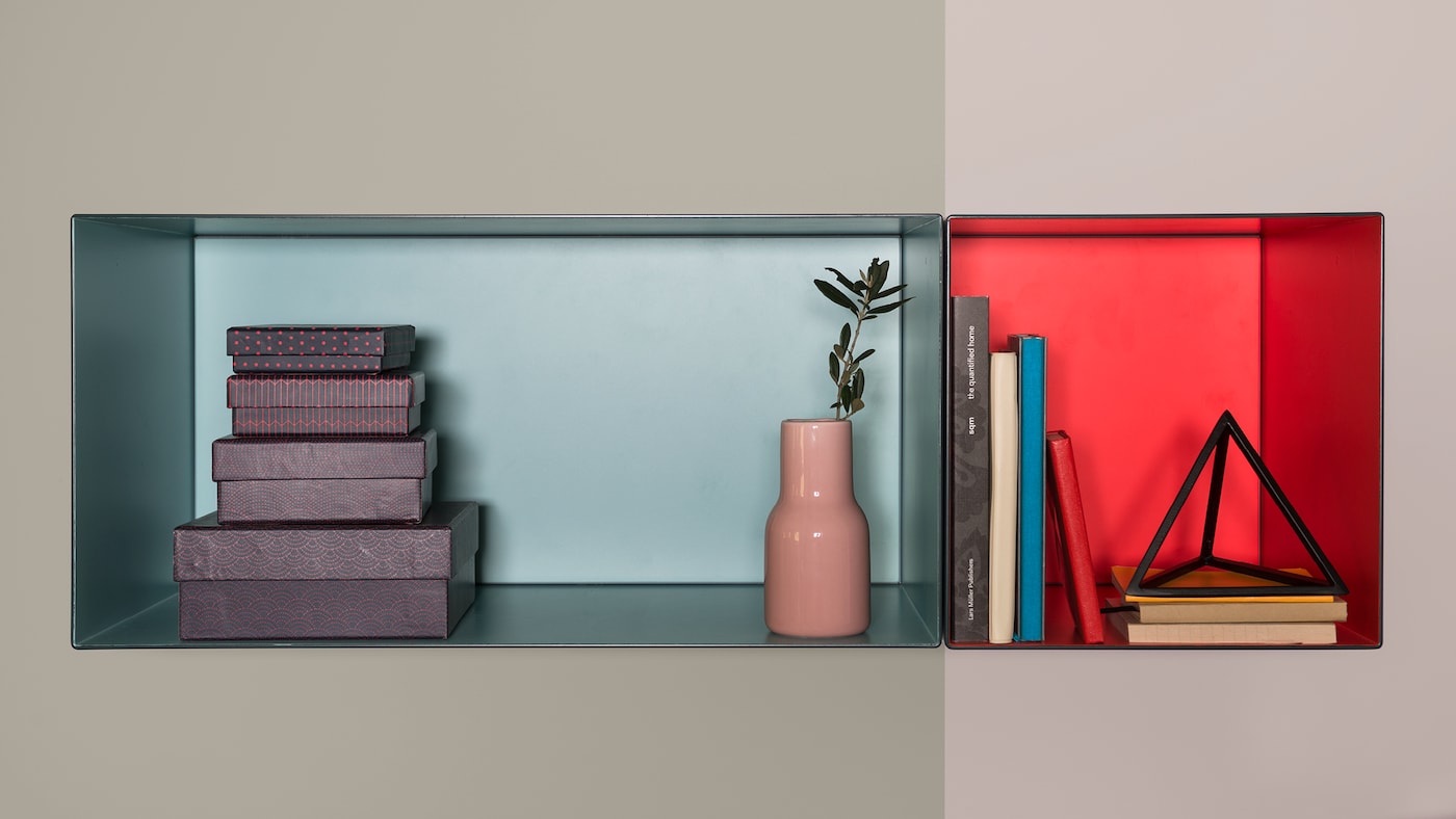 Los colores acentuados fuertes ayudan a definir el área del dormitorio.