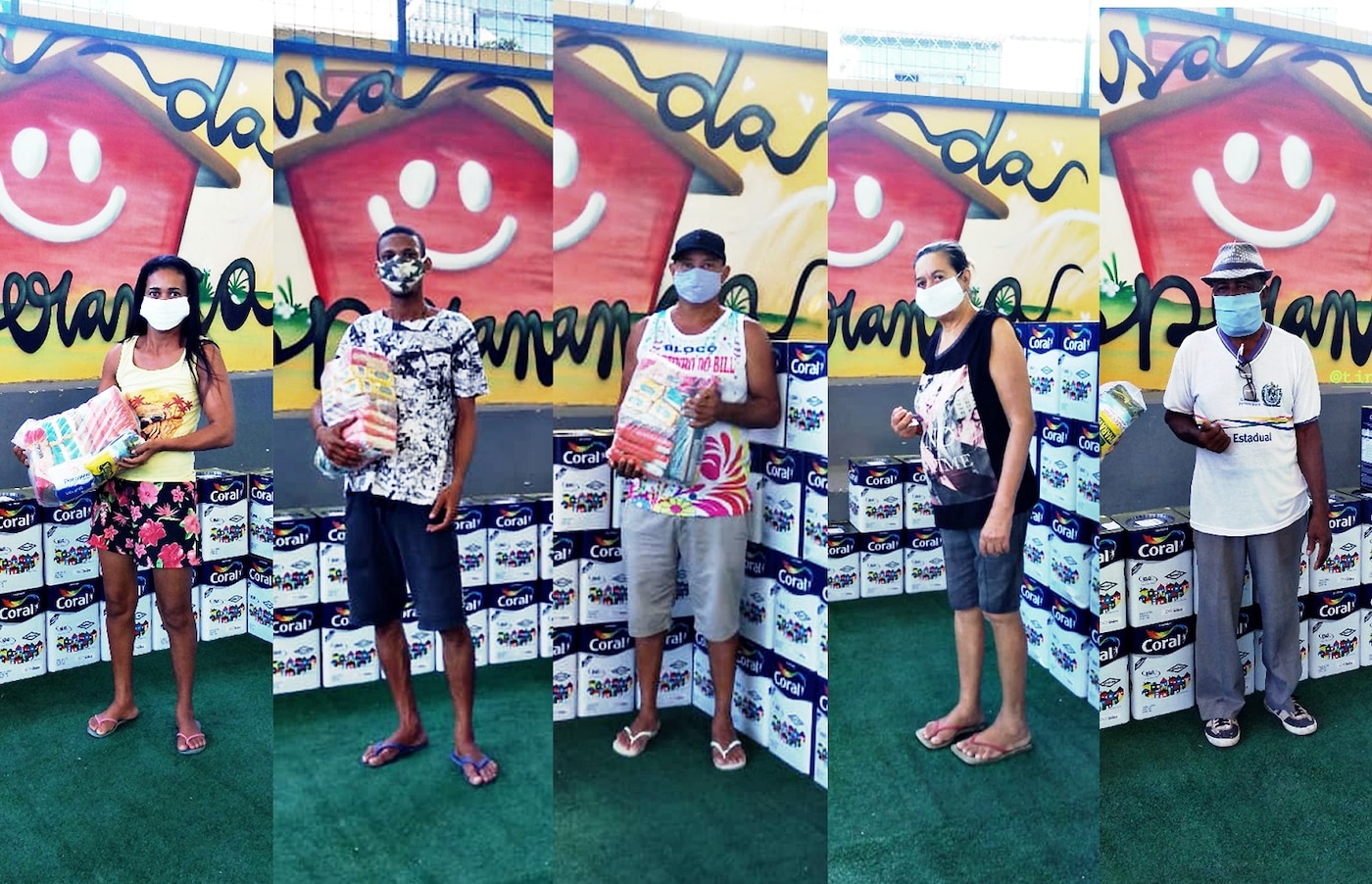 Pessoas recebendo as doações de alimentos em parceria com as Tintas Coral.