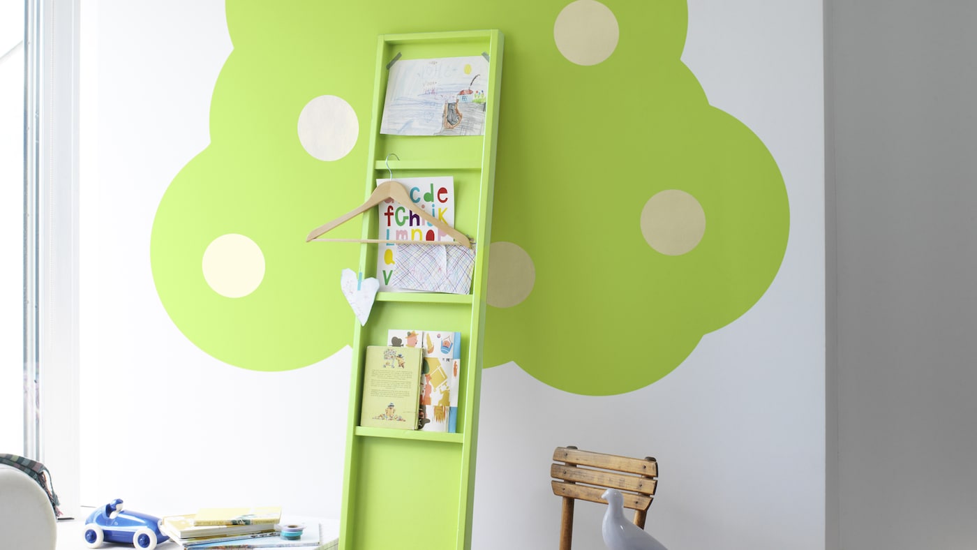 Streichen Sie die Wände des Kinderzimmers mit Kreisen, um Bäume zu symbolisieren.