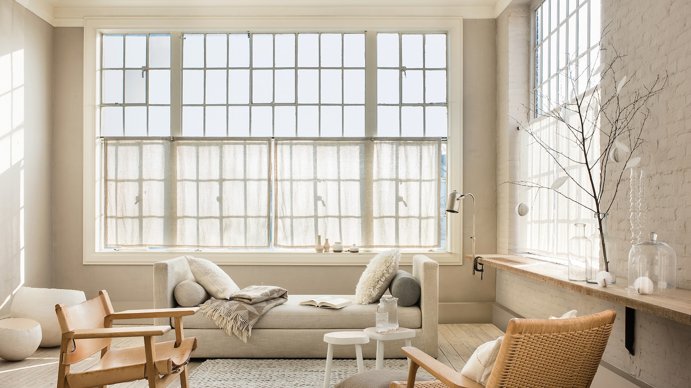 Pairing natural textures with off-white tones will add depth to your room.