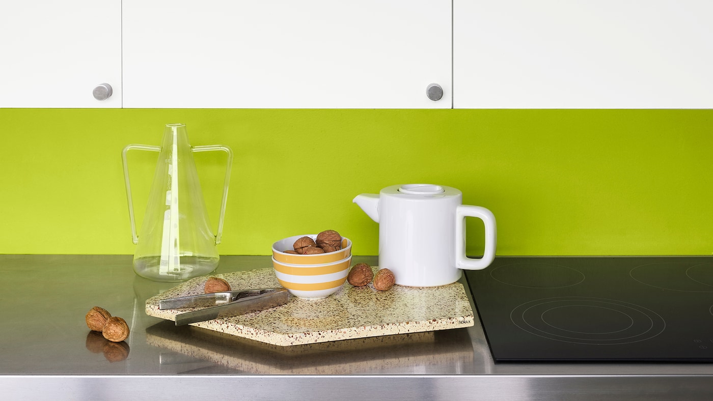 Cut through the clean white walls of a kitchen with a daring dash of lime