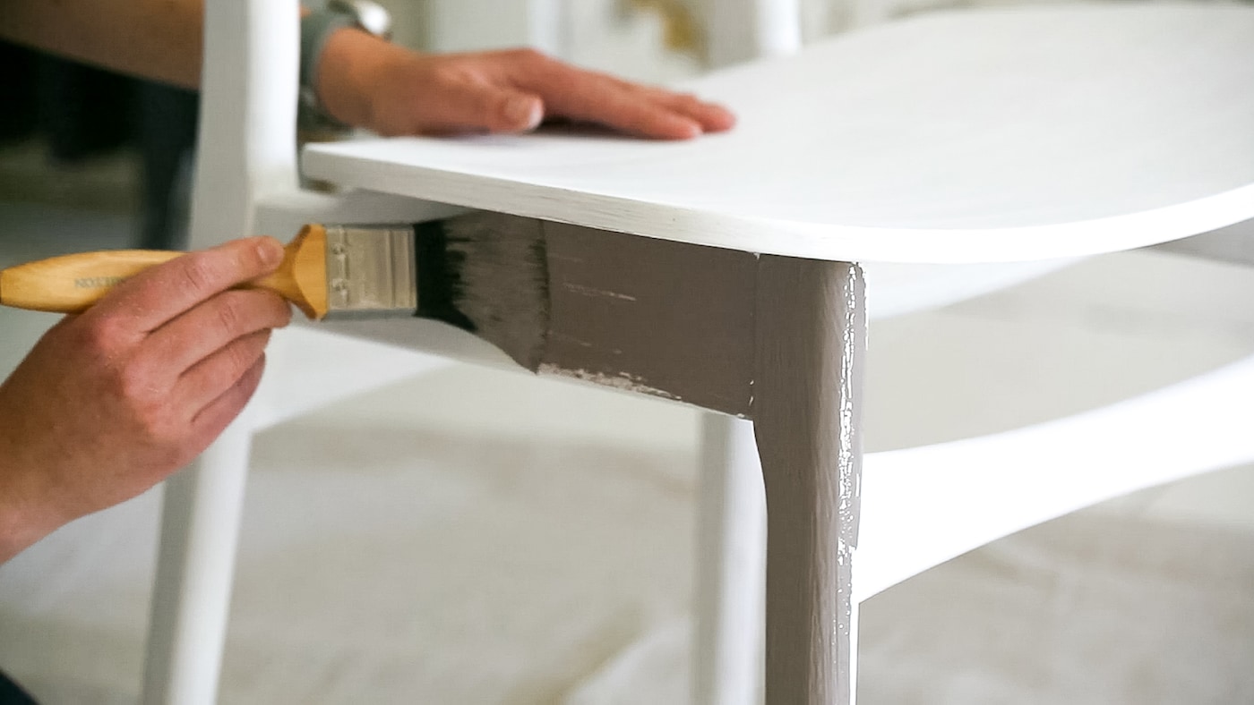 Painting wooden chairs is a great way to use up leftover paint and complement the colours on your walls.