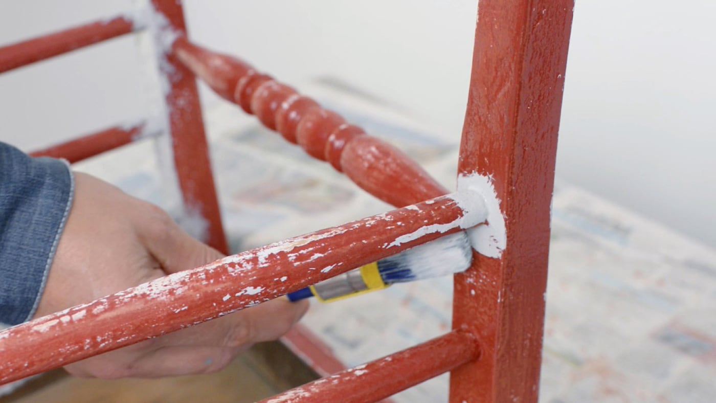 Using a synthetic brush is best for uneven surfaces as it creates smooth strokes and coats surface contours.