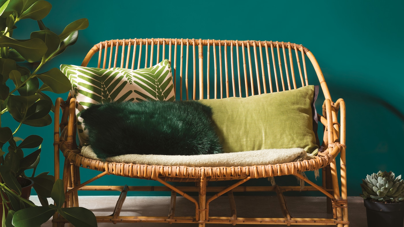 Natural woods stand out beautifully when paired with a palette of earthy greens.