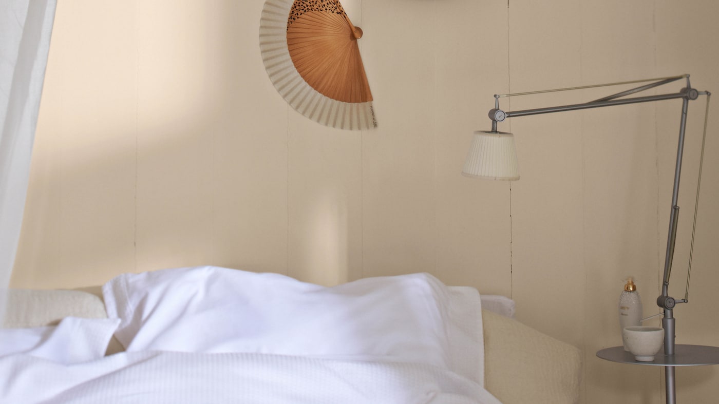 Once you’ve made space for a crib, choose complementary colours that will help define the baby zone from the rest of the bedroom.