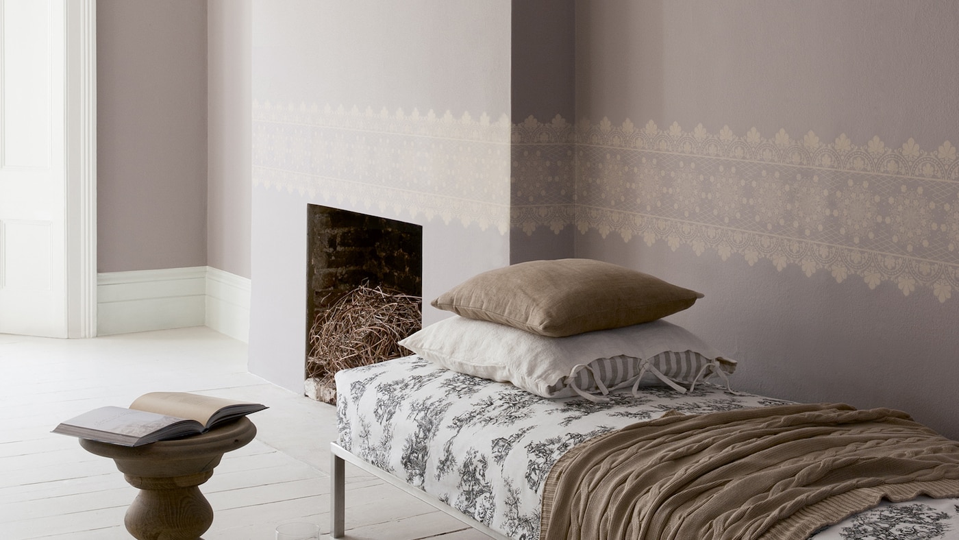 A living room decorated in warm shades of chocolate brown.