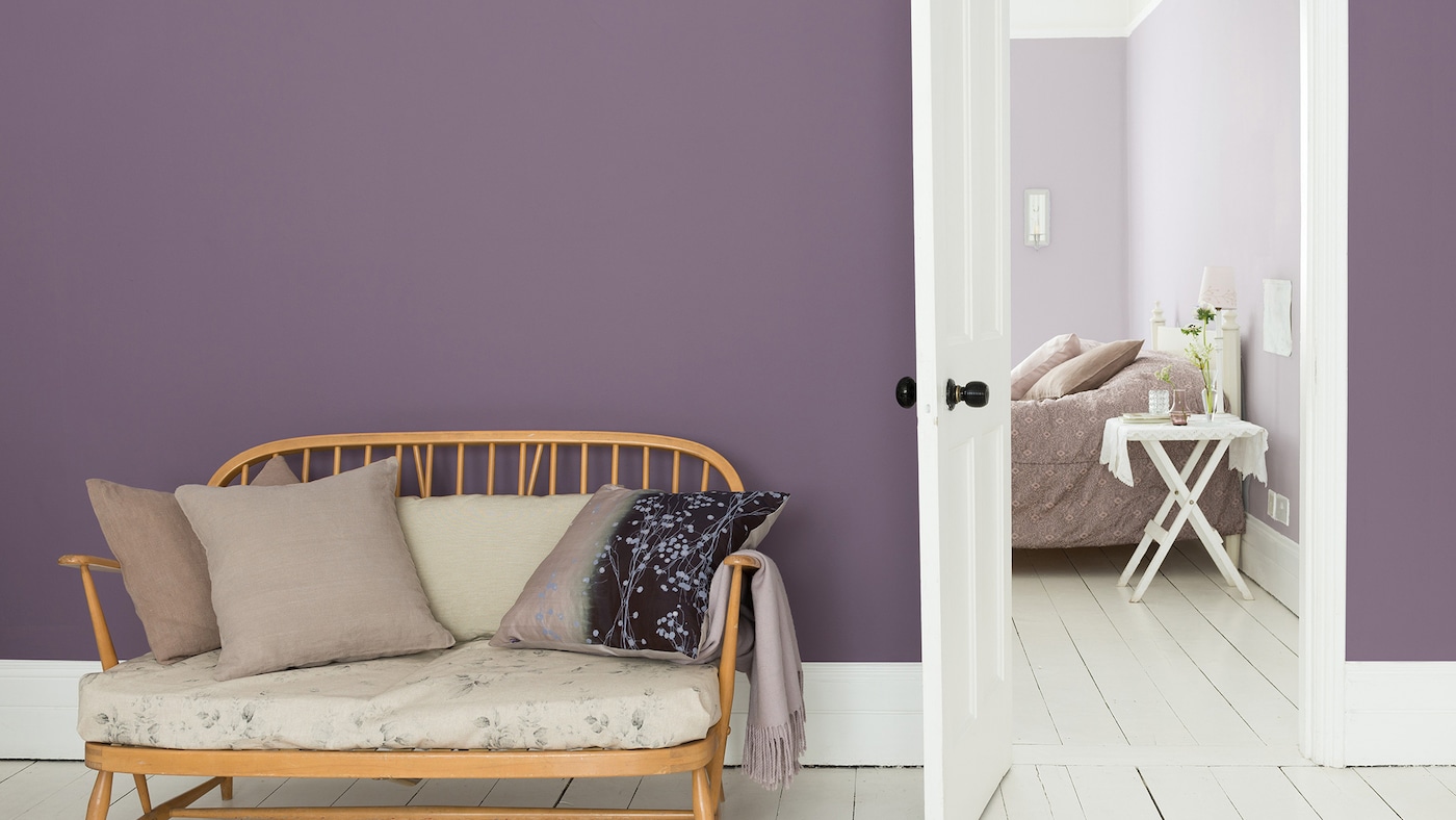 Make a bold statement in the hallway with a purple and white colour scheme.  