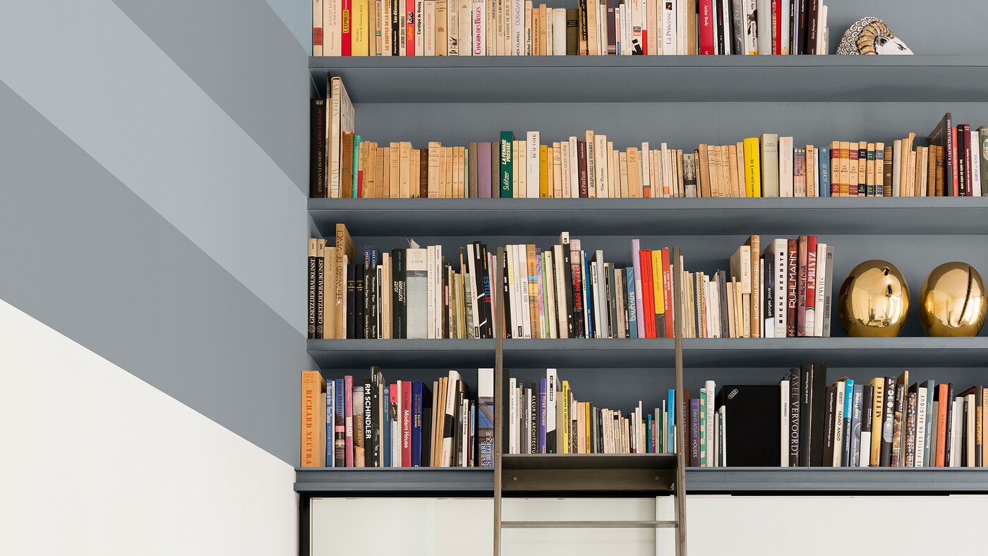 Want to transform your home office? For a small update that creates a big impact, paint striking stripes in cool neutrals.