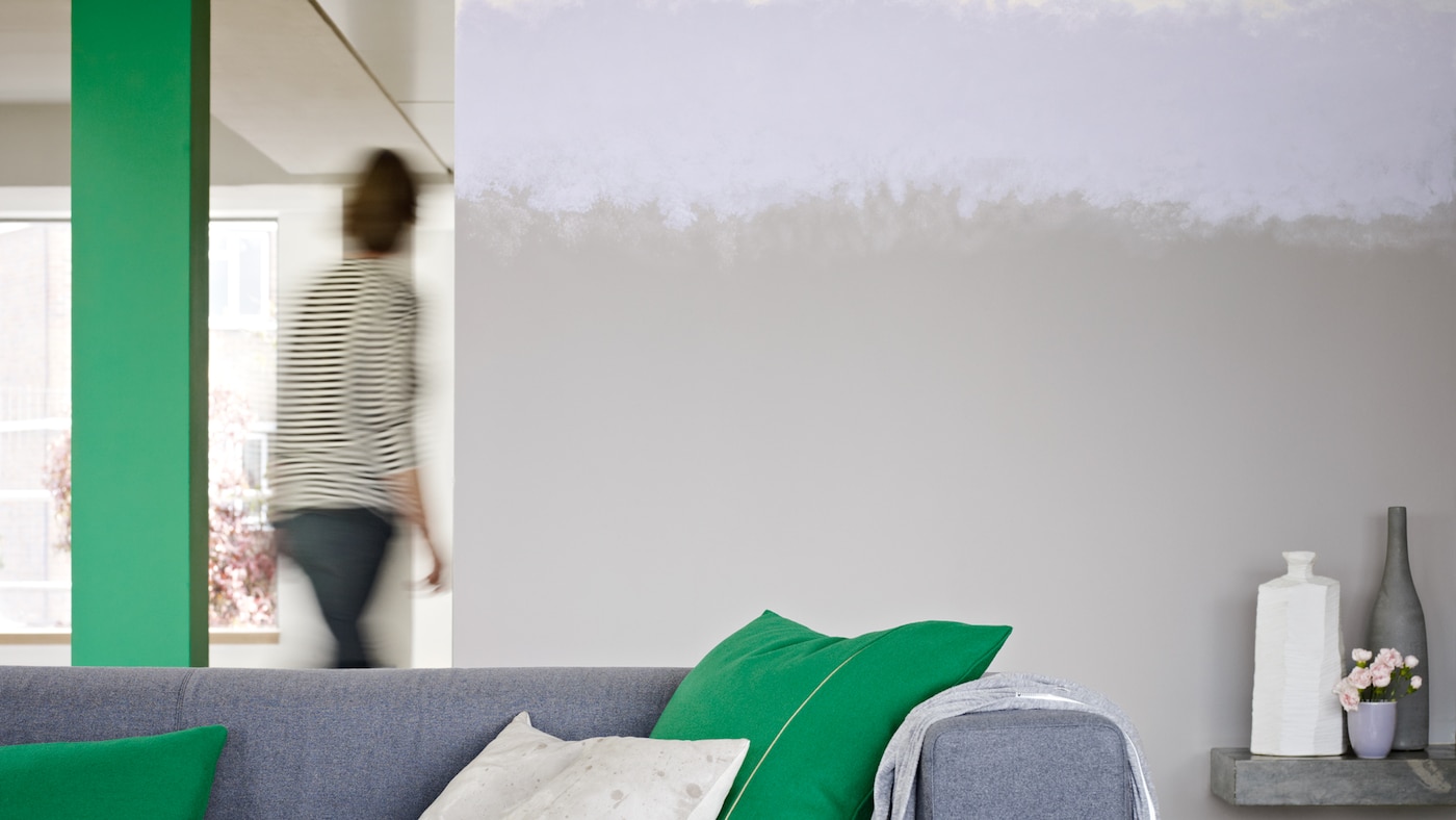 Stripes of purple and grey create a moody atmosphere.