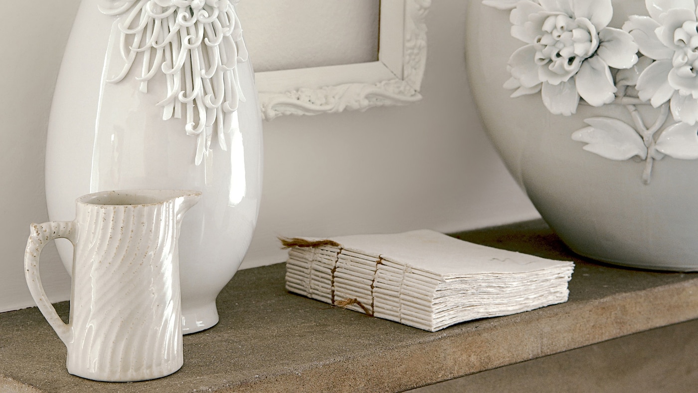 Highlight textures with a pared-back palette of off-whites.
