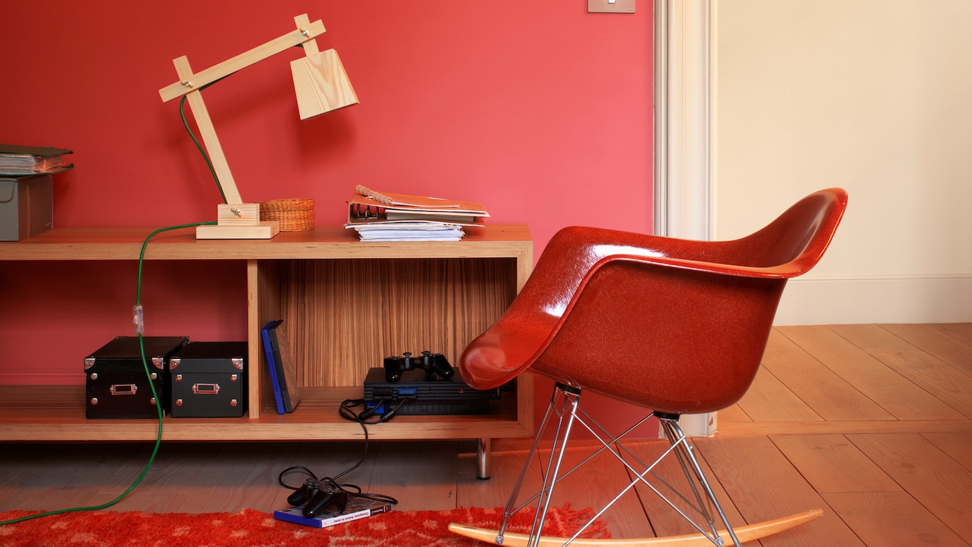 Warm red shades make a living room feel comfortable and inviting.