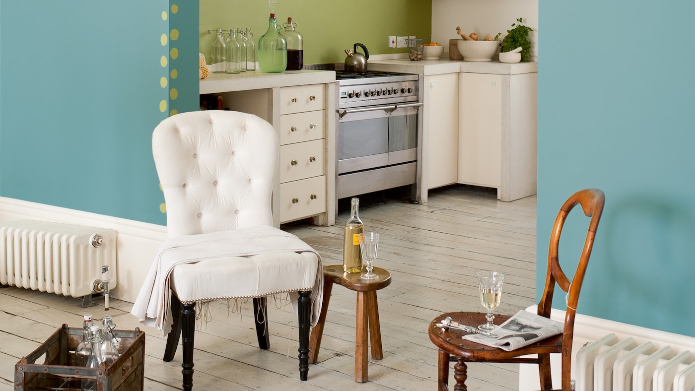 Open plan living is balanced by combining calming greens.
