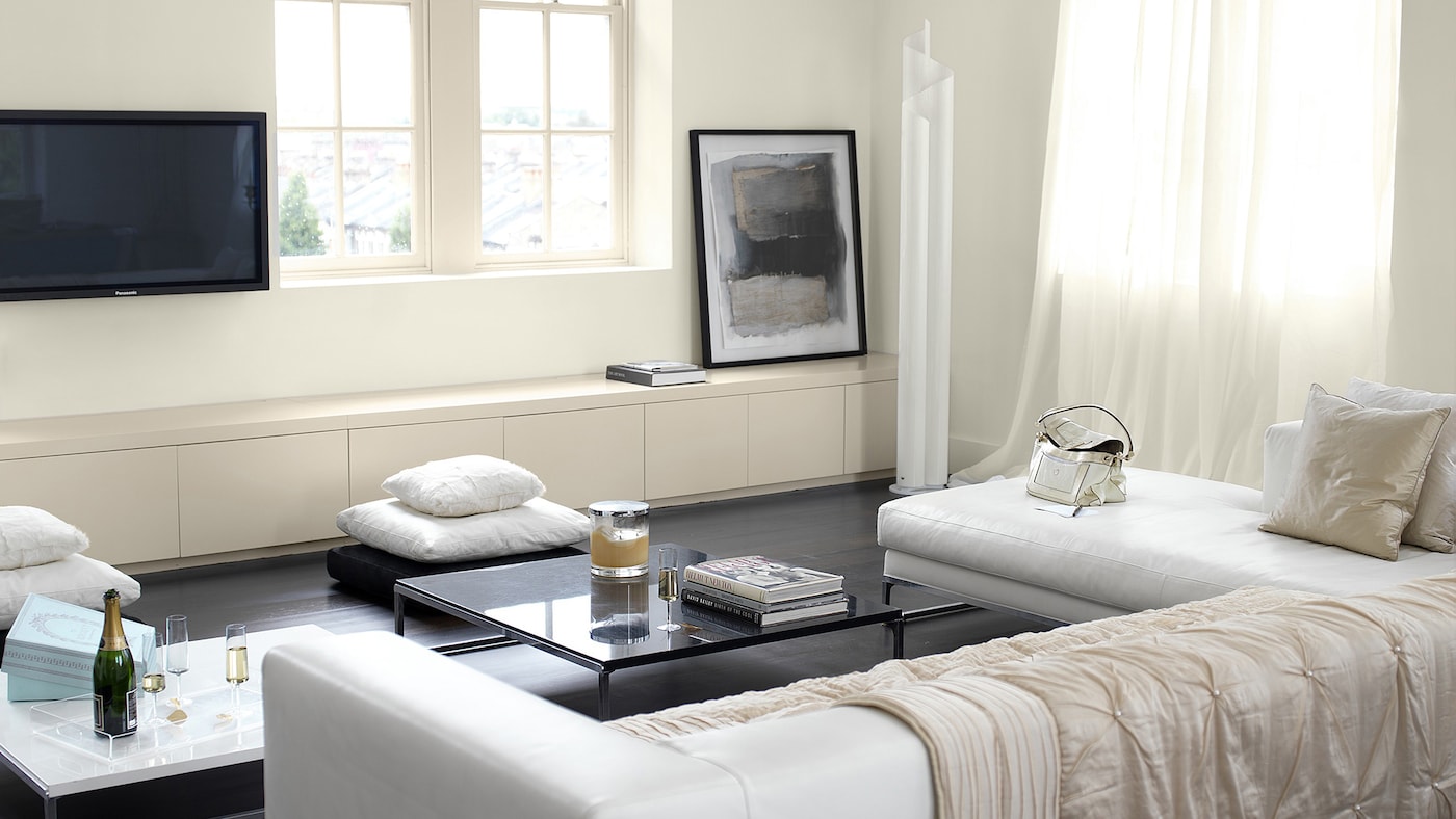 Using different textures in a neutral room creates sophisticated depth.