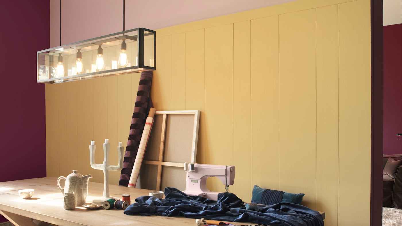 Use rich pinks to add creative passion to a wall of yellow.