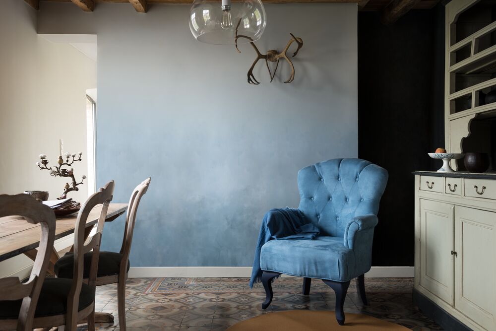 Blue Sofa in Neutral Colour Wall