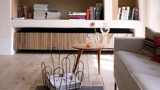 Exaggerate the depth of niche shelving