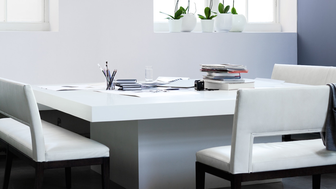 Toning down black and white, just a fraction, makes it feel more palatable without losing its graphic punch