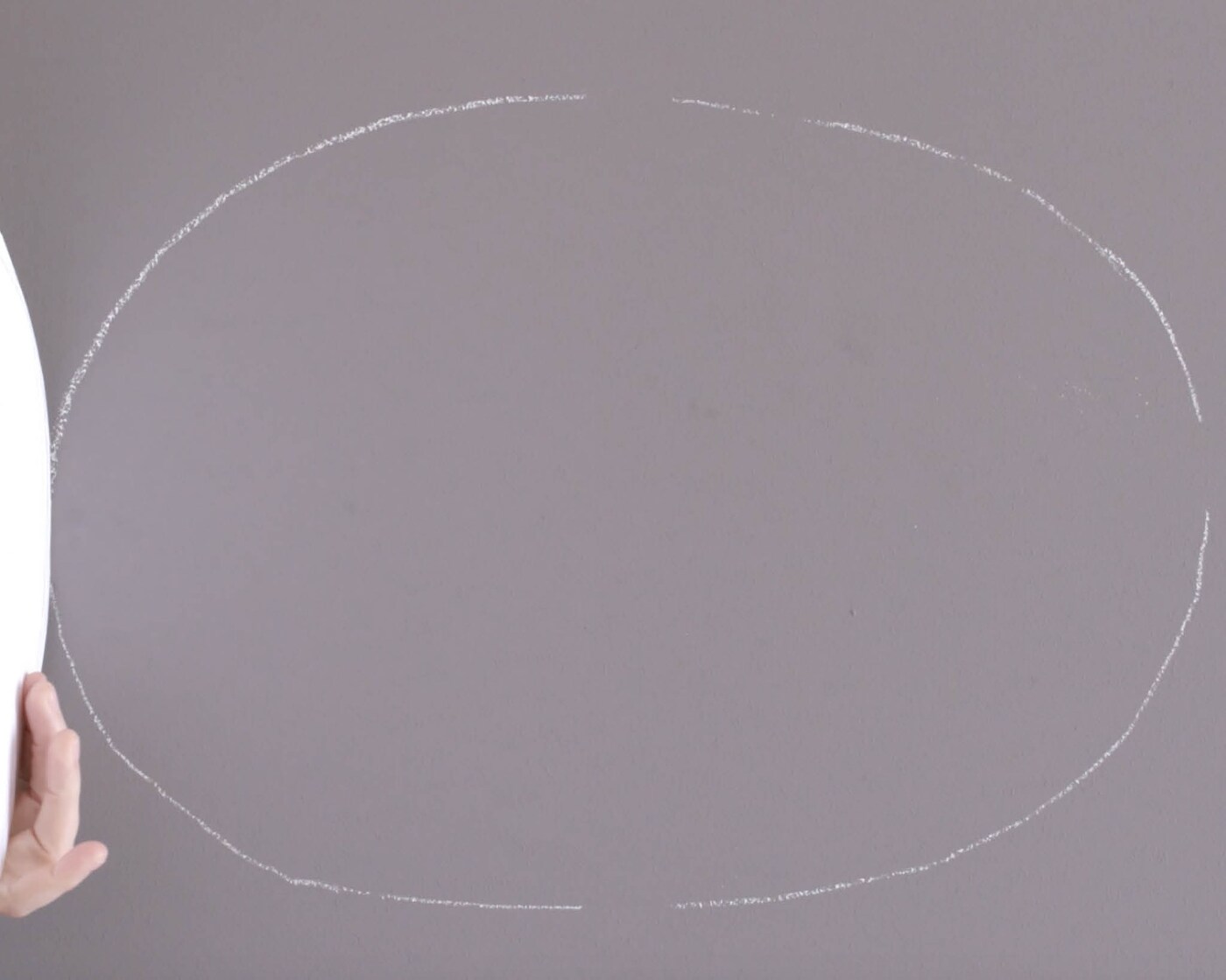Use chalk to draw around your oval shape