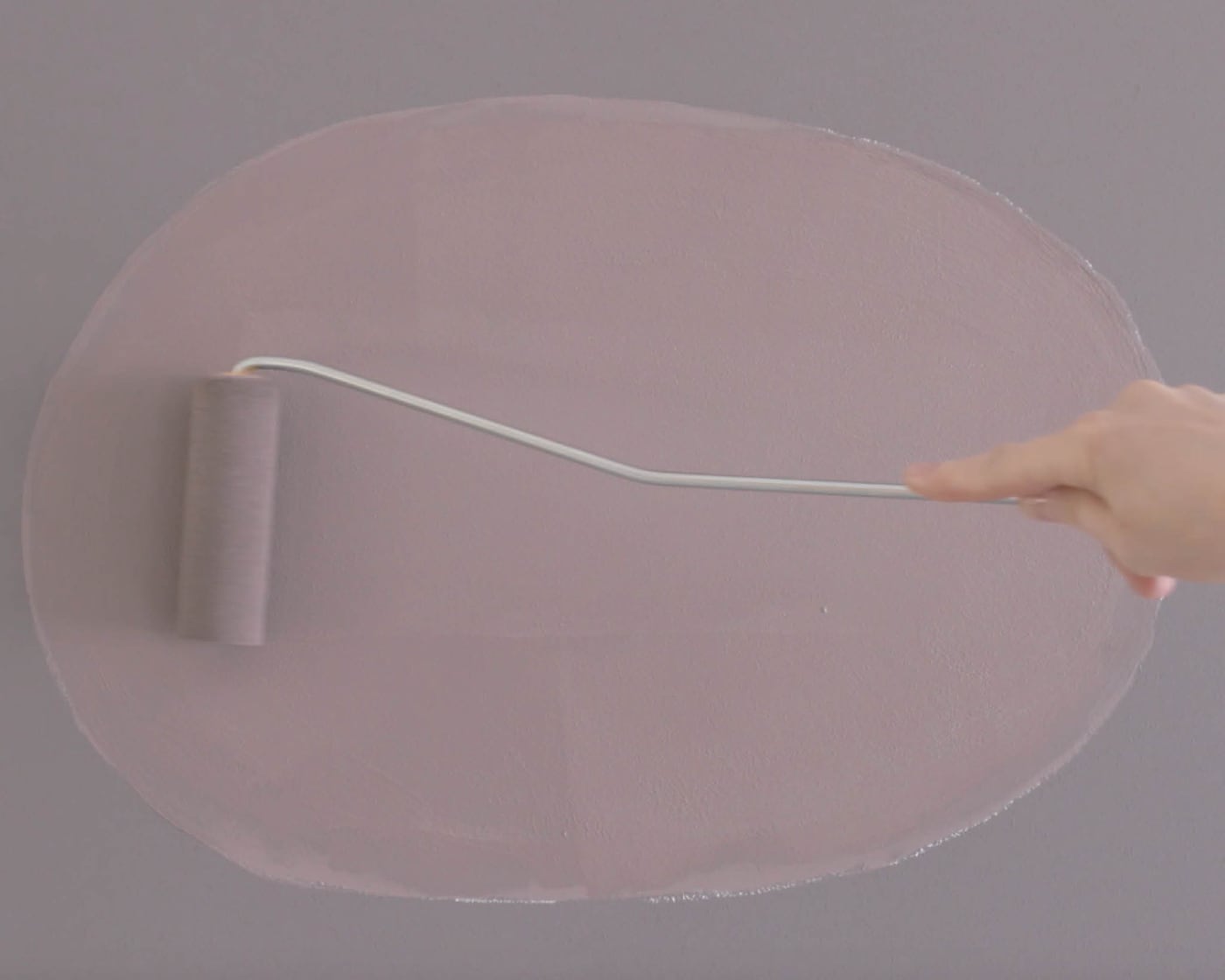 Paint your oval with a small roller and paint brush