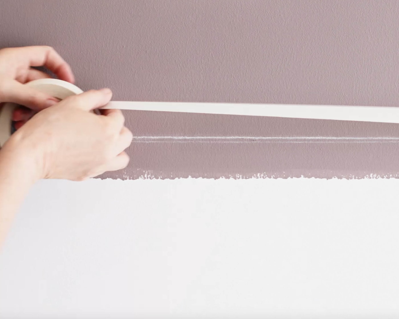 Apply masking tape along your chalked line when your paint is dry