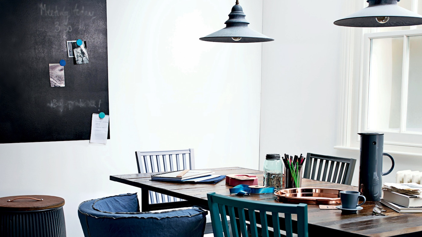 Painting a small area with blackboard paint will transform your walls into a stylish space for essential shopping lists - plus the kids will love drawing on it!