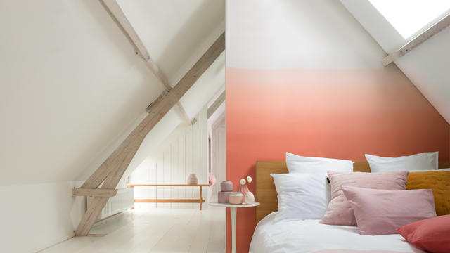 Create a restful breakout space with an accent colour painted fading into a neutral base.