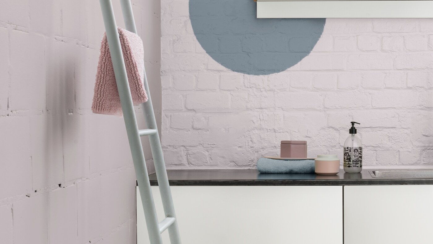 Unexpected geometric shapes painted in accent colours bring energy to a space.