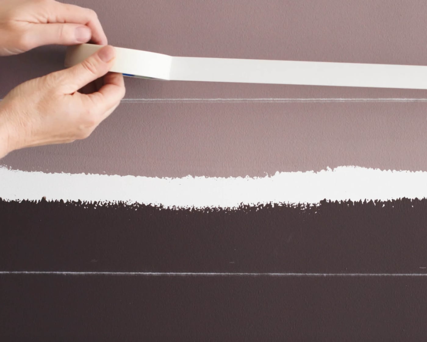 Apply masking tape along your chalked lines