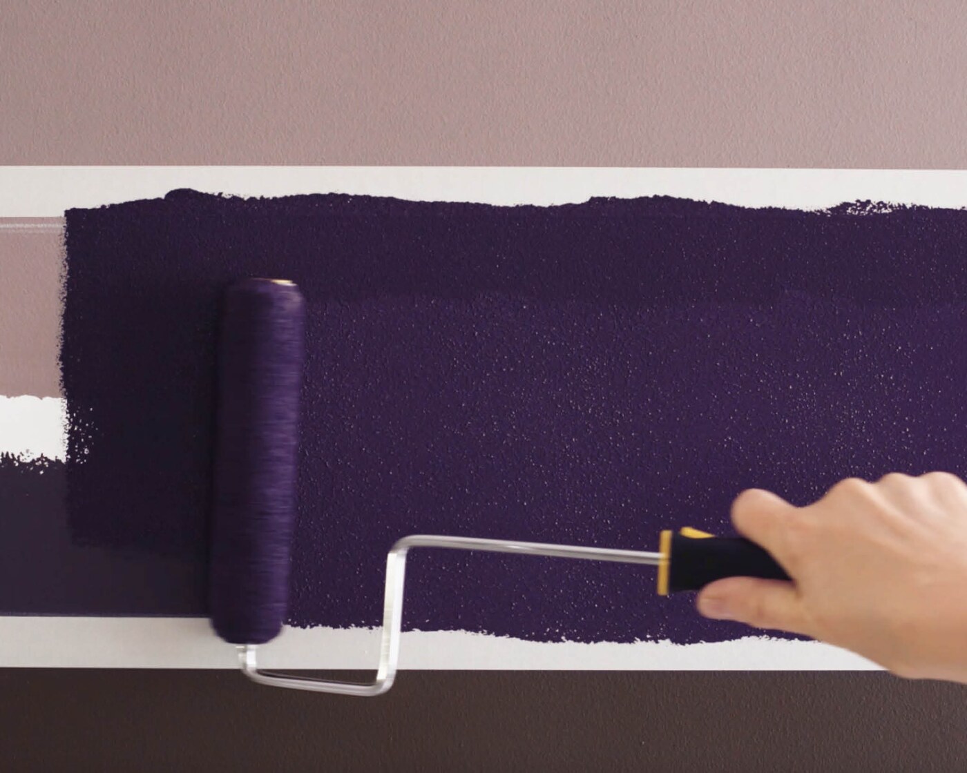 Paint between your taped lines with a small roller
