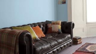 Use bright blue to set off earthy tones