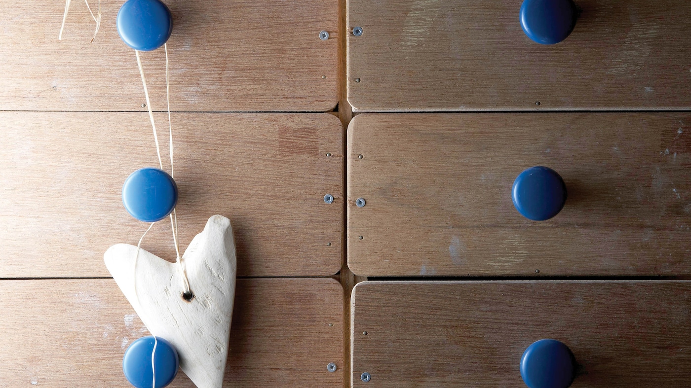 Scour local markets for pretty ceramic knobs that don’t cost the earth and complement the colour of your walls.